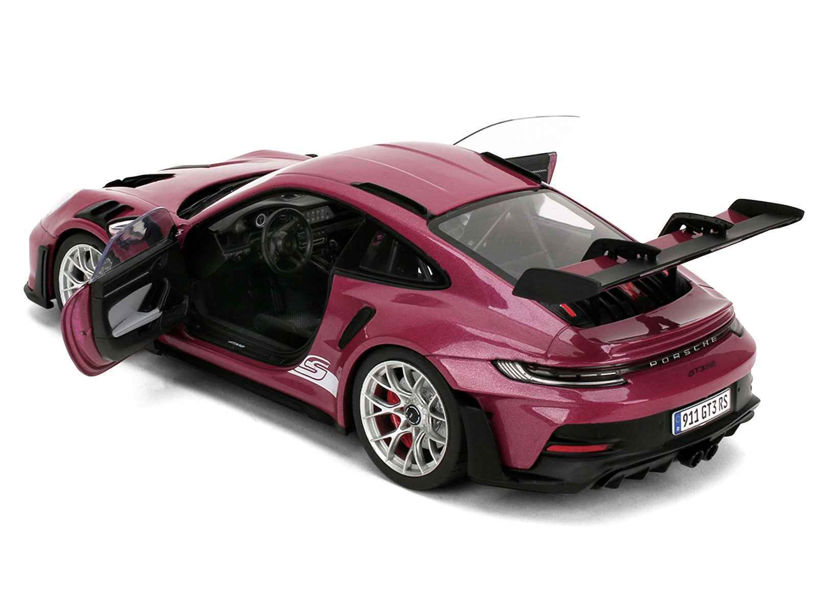 Porsche 911 GT3 RS diecast model car in pink-violet with white racing stripes