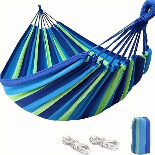 Portable hammock with blue, green, and lime striped fabric and rope hanging loops