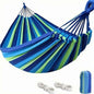 Portable hammock with blue, green, and lime striped fabric and rope hanging loops