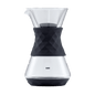 Pour-over coffee maker with clear glass carafe and black textured dripper