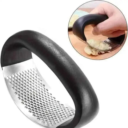 Black-handled garlic rocker press with stainless perforated grating insert