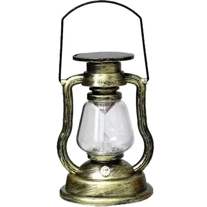 Retro kerosene lantern light with gold frame, clear glass chimney, and carry handle.