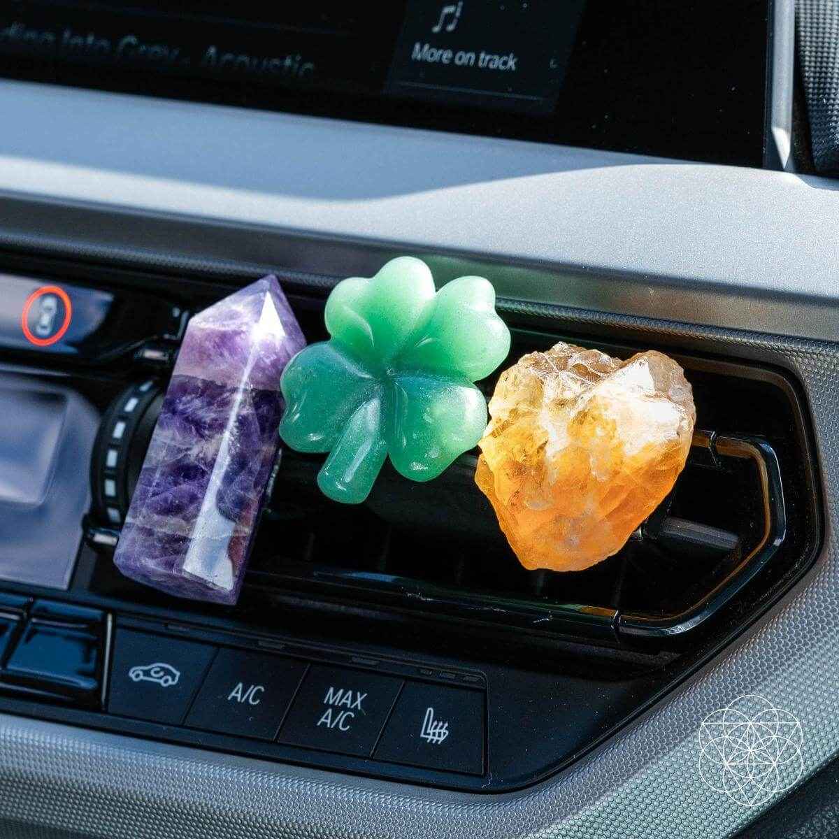 Car air vent crystal kit: purple tower, green clover, orange crystal on vent