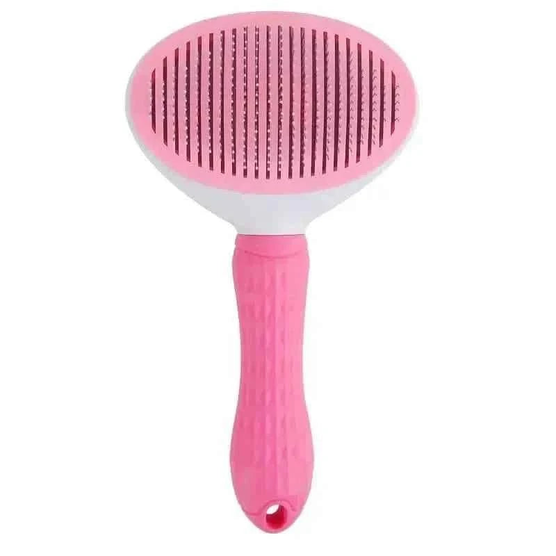Pink pet slicker brush with pin bristles on oval head and ribbed handle