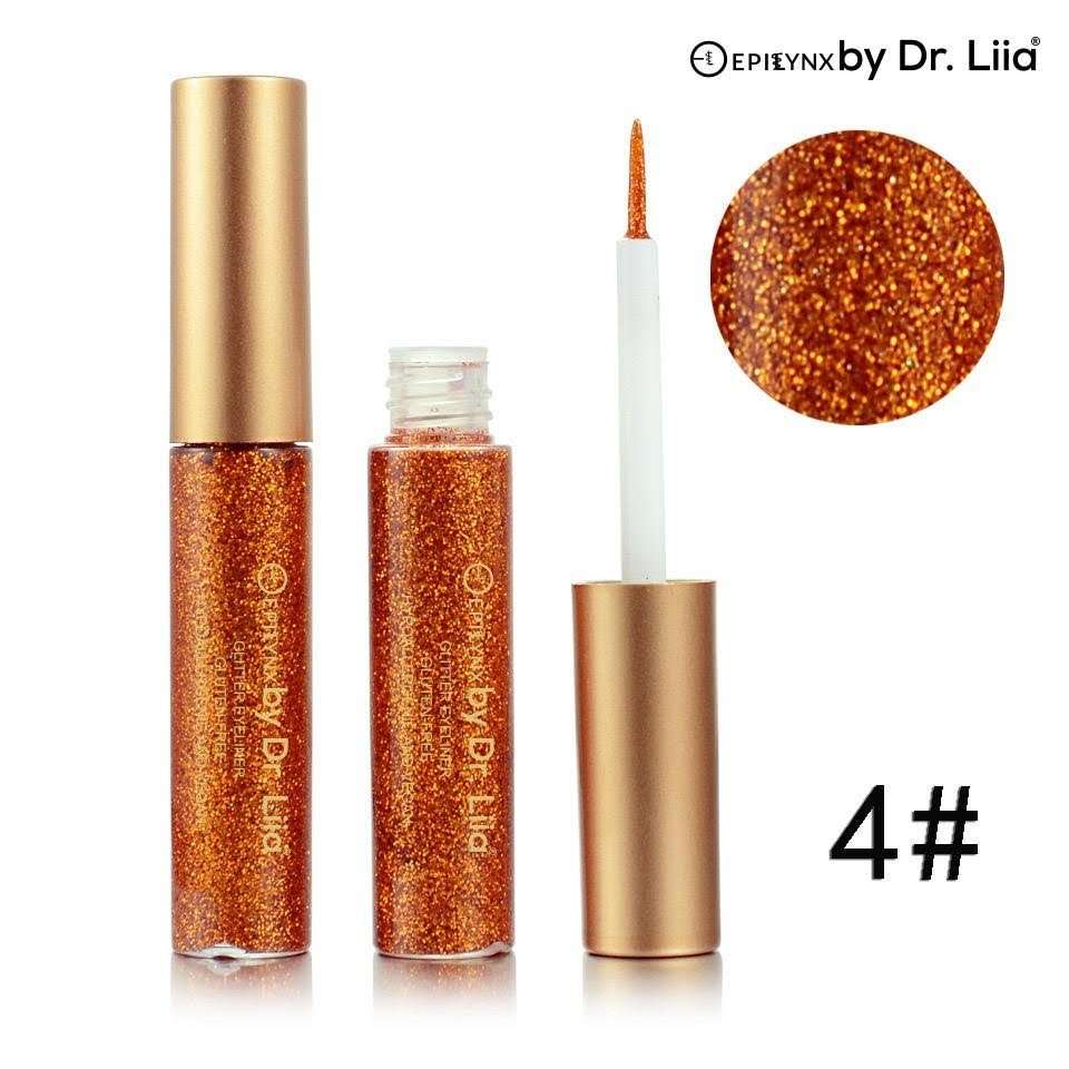 Glitter eyeliner set with copper-orange shimmer and pointed applicator tip.