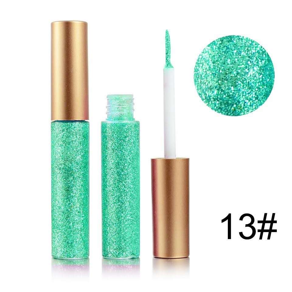 Green glitter eyeliner bottle with gold cap and clear wand tip