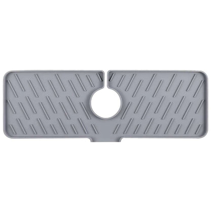Silicone faucet kitchen sink mat in gray, with center faucet hole and drain ridges