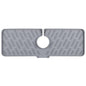 Silicone faucet kitchen sink mat in gray, with center faucet hole and drain ridges