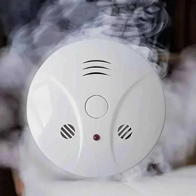 Portable photoelectric smoke and fire alarm, white with alarm light and speaker vents