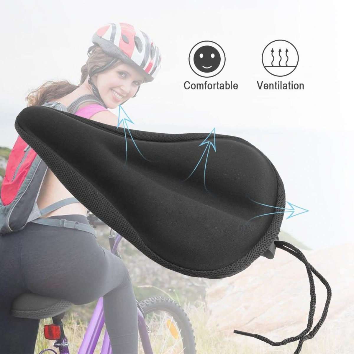 Black gel bike seat cushion cover worn on a bicycle saddle with cord ties