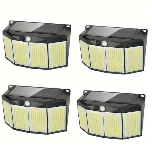 Set of four black outdoor solar lights with solar panels and three LED panels each