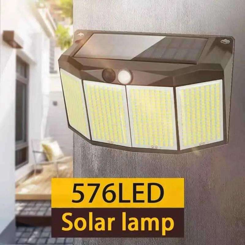 Outdoor solar wall light with solar panel, two front lenses, and three illuminated LED panels