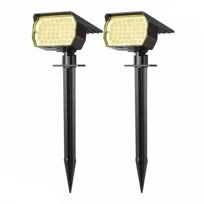 Solar motion sensor spotlights, two pack: black stake lights with LED panels