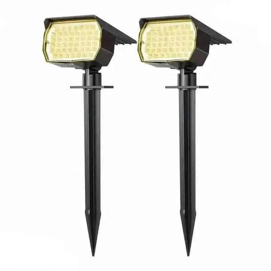 Solar motion sensor spotlights, two pack: black stake lights with LED panels
