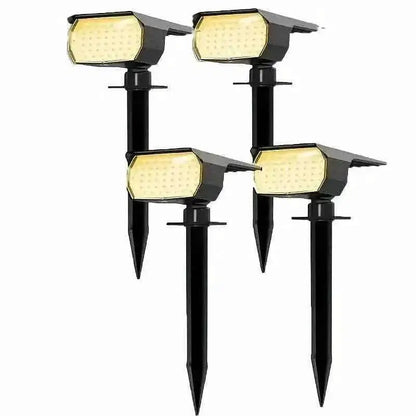 Solar motion sensor spotlight set with four black stake-mounted LED lights