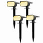 Solar motion sensor spotlight set with four black stake-mounted LED lights
