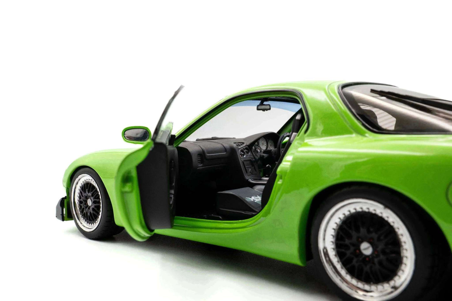 1:18 die-cast sports car, neon green Mazda RX7 FD3RS with open door detail