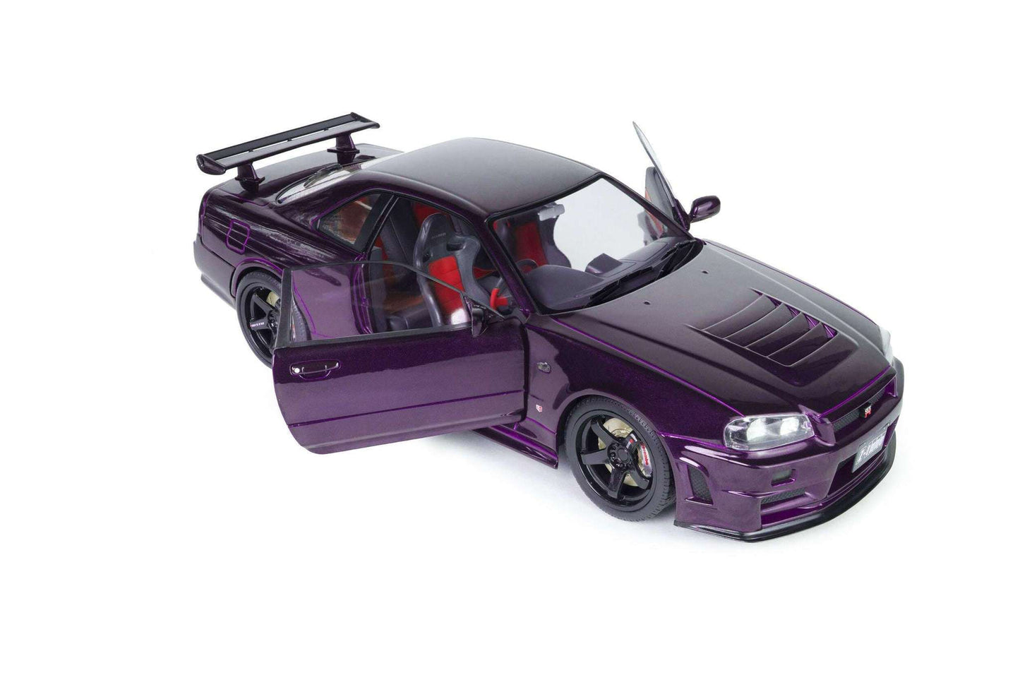Purple 1:18 Skyline GT-R model car, front-side view with hood details