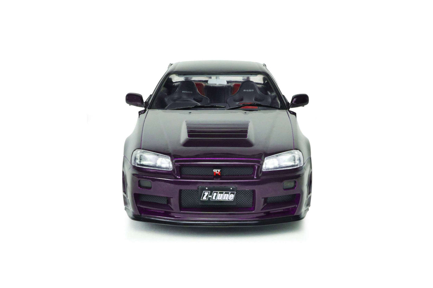Front view of purple 1:18 Nissan Skyline GT-R die-cast model with grille and bumper details
