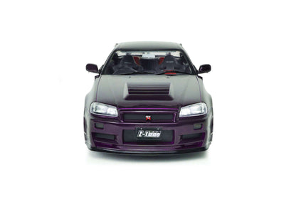 Front view of purple 1:18 Nissan Skyline GT-R die-cast model with grille and bumper details