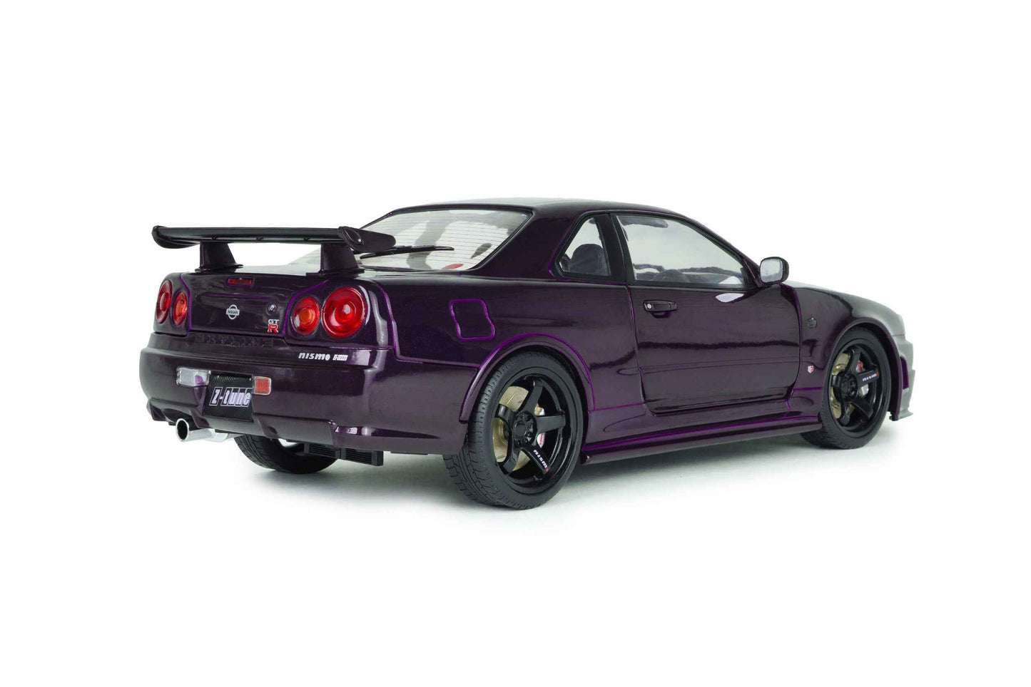 Three-quarter rear view of purple 1:18 Nissan Skyline GT-R die-cast model, black wheels