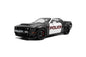 Black-and-white police die-cast car model, front three-quarter view