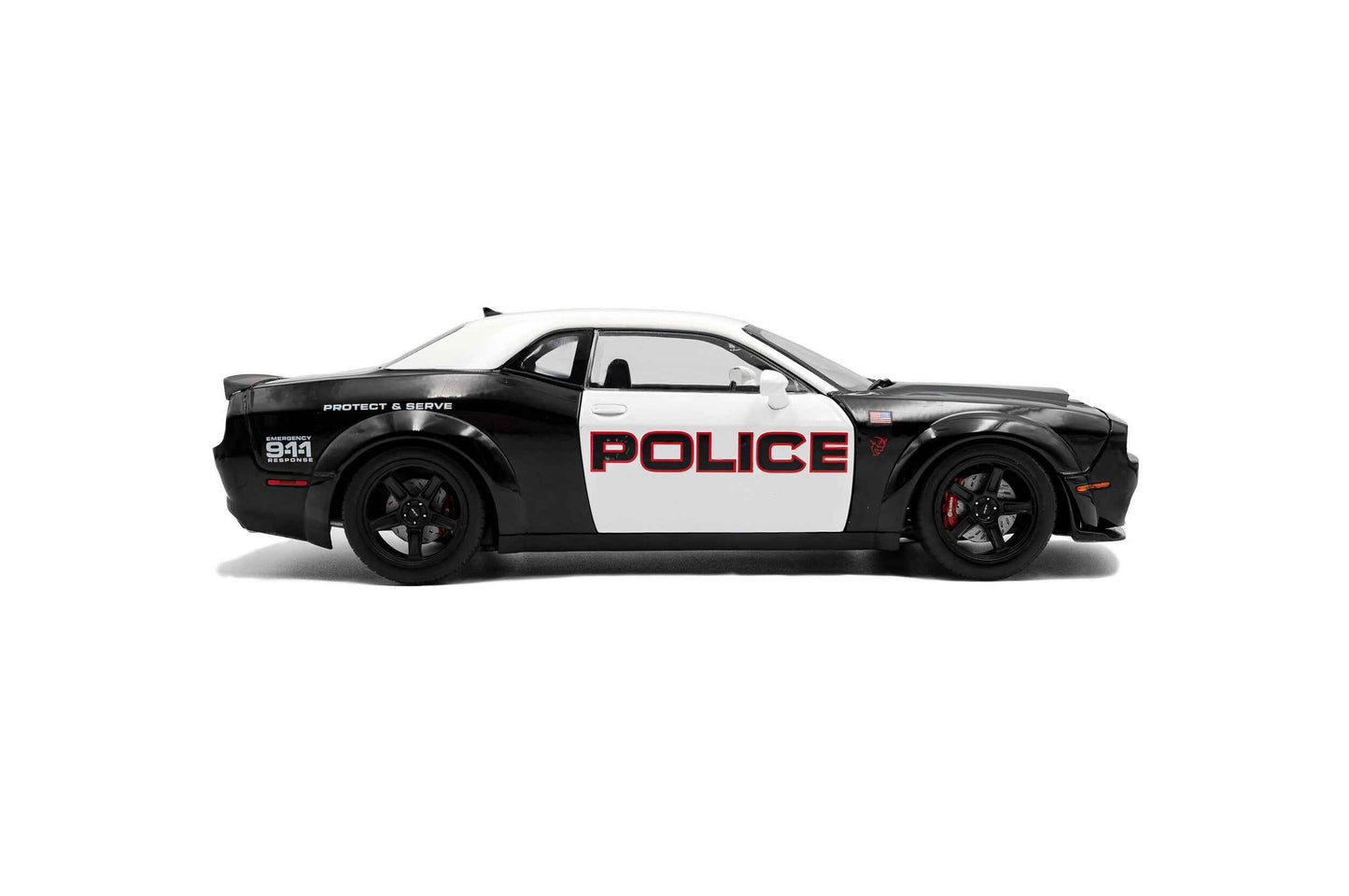 Black-and-white police die-cast car model, side view with POLICE and wheel details
