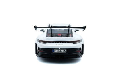 White 1:18 Porsche GT3 RS die-cast rear view with large black wing and exhaust details