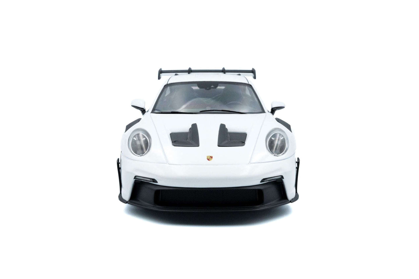 White 1:18 Porsche GT3 RS die-cast front view with black hood vents and round headlights