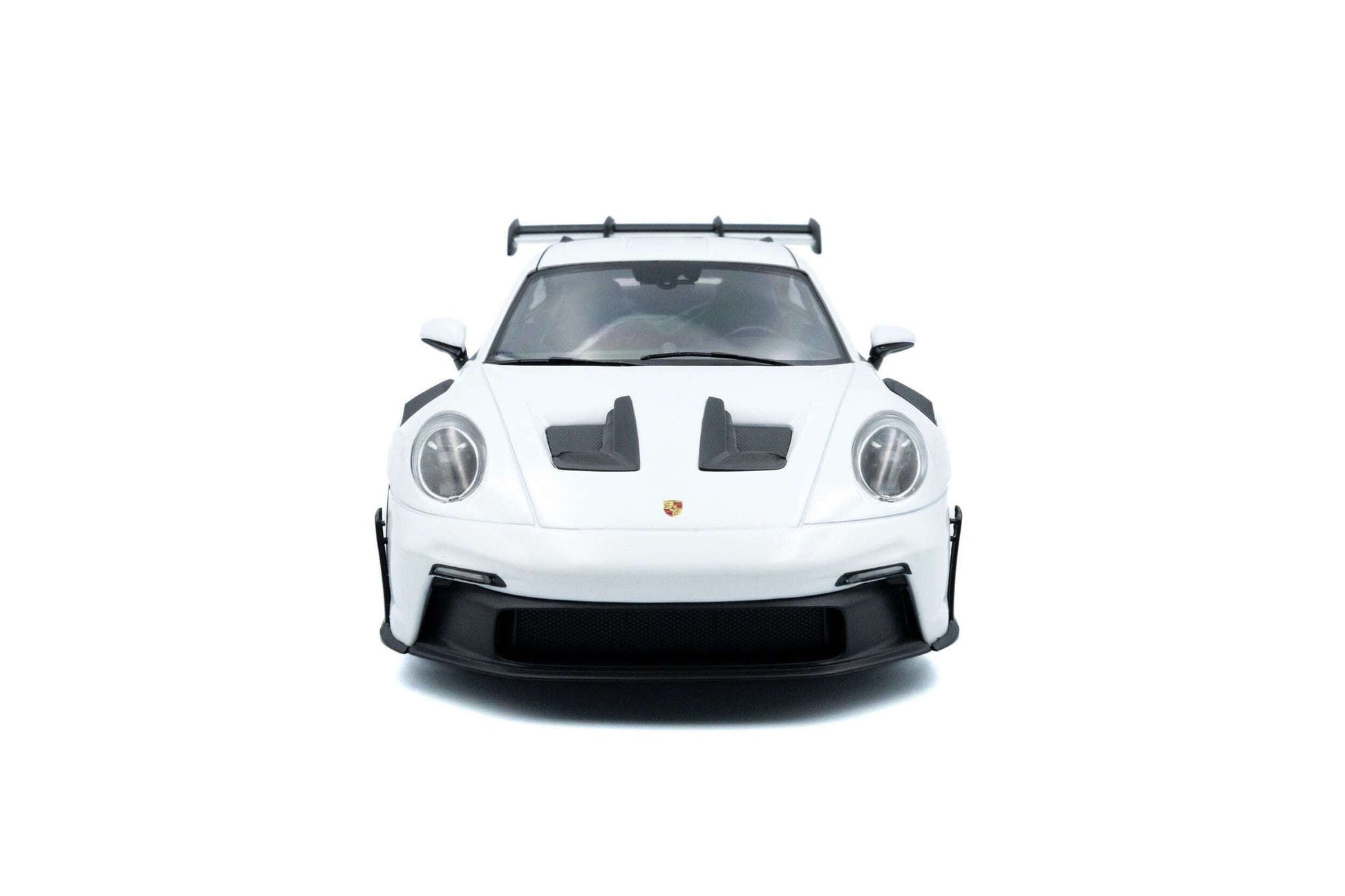White 1:18 Porsche GT3 RS die-cast front view with black hood vents and round headlights
