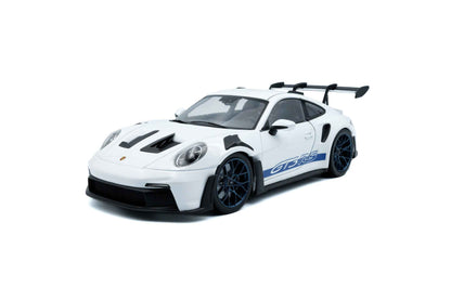 White 1:18 Porsche GT3 RS die-cast with blue side stripe and dark wheels, front 3/4 view