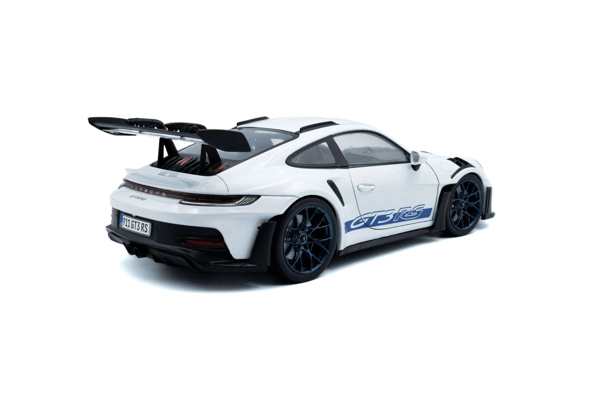 White 1:18 Porsche GT3 RS die-cast rear 3/4 view, blue stripe and dark wheels
