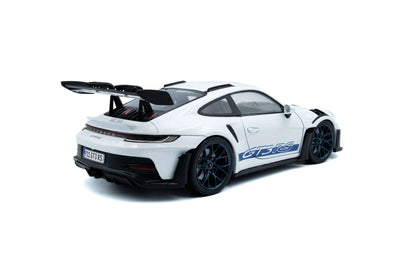 White 1:18 Porsche GT3 RS die-cast rear 3/4 view, blue stripe and dark wheels