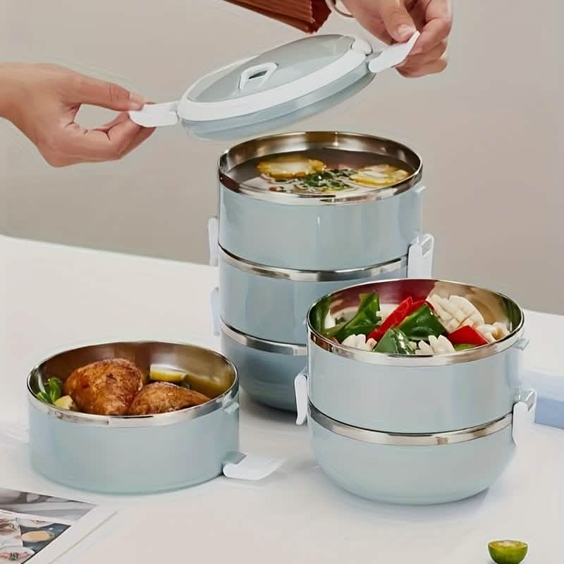 Light blue insulated bento lunch box set with stacked containers filled with meals