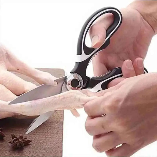 Kitchen scissors with serrated and pointed blades, black-and-silver handle
