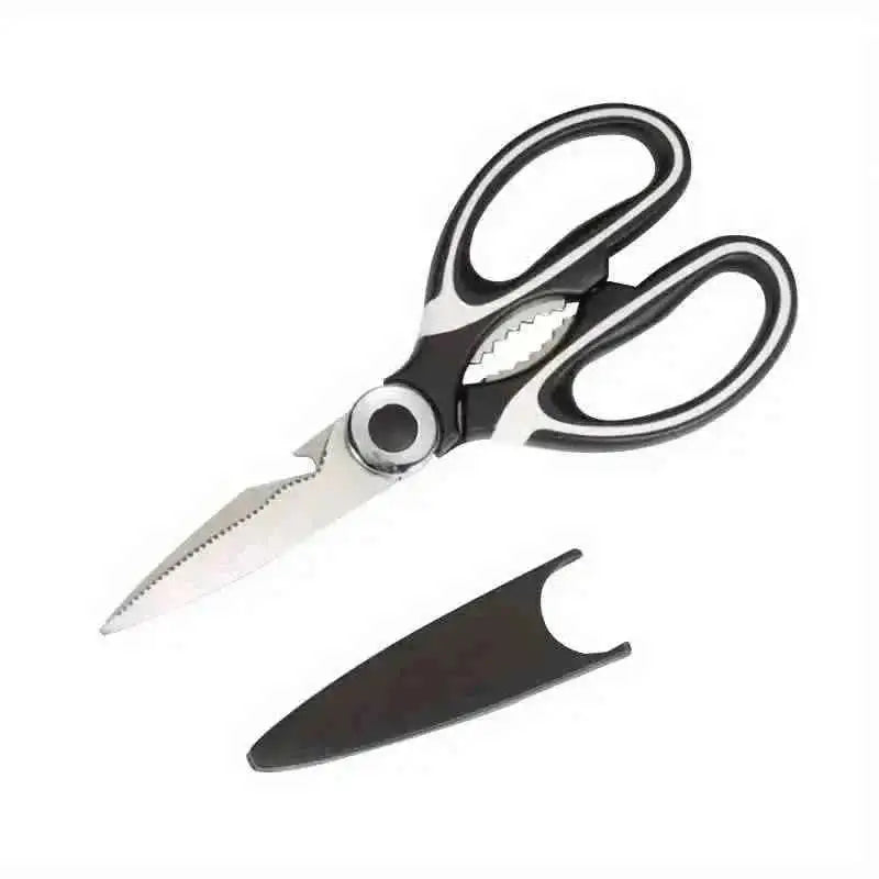 Multi-purpose kitchen scissors with two blades and serrated tool
