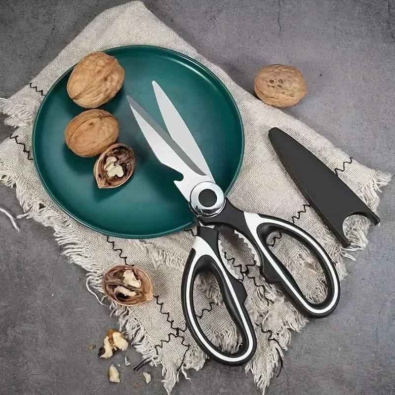 Kitchen scissors with bottle opener and serrated blade, black-and-silver