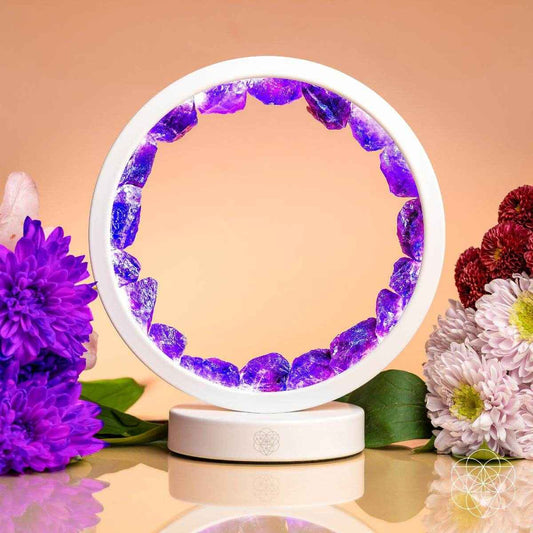 White amethyst healing lamp with purple crystal ring glow and circular base