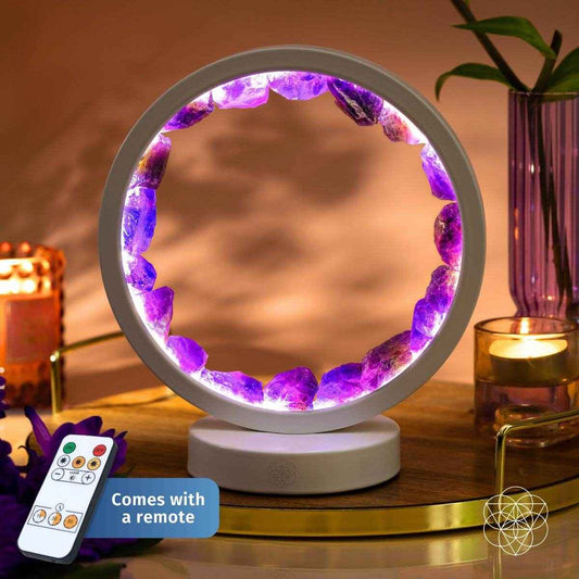 White amethyst healing lamp on round base with glowing purple crystal ring