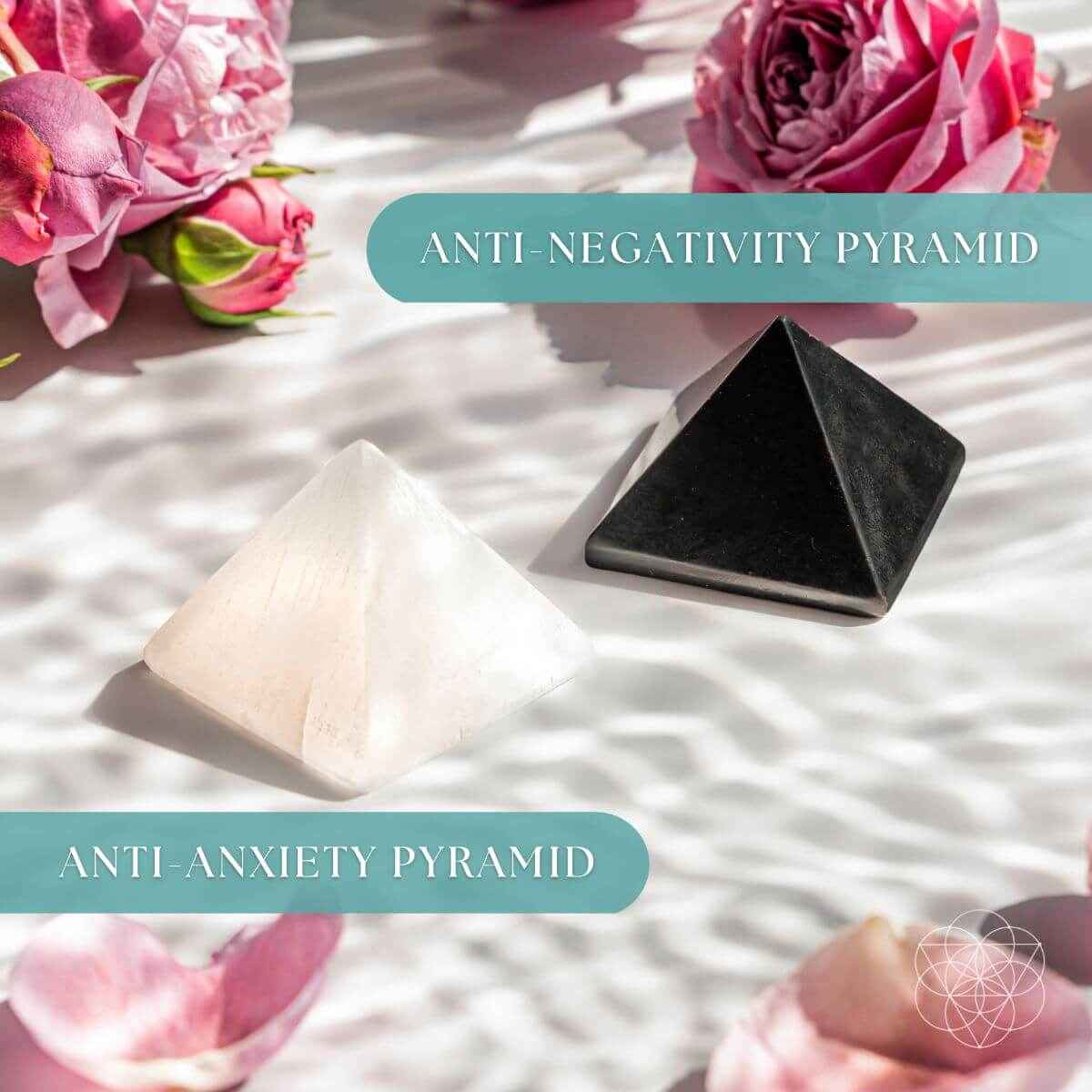 Anti-negativity crystal pyramid, black and off-white with triangular facets