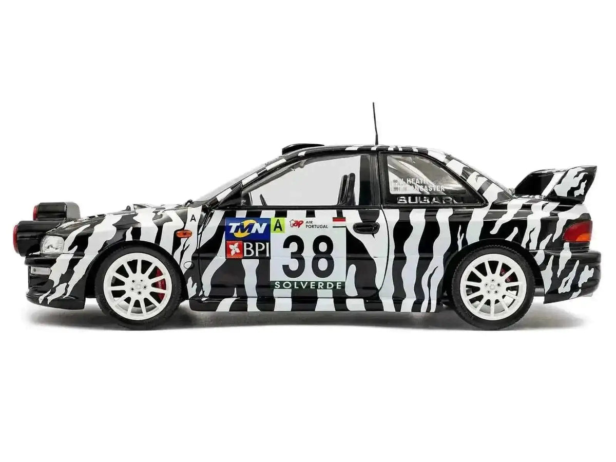 Subaru Impreza S5 WRC99 #38 Nigel Heath - Steve Lancaster "Rallye de Portugal" (2001) "Competition" Series 1/18 Diecast Model Car by Solido Cartsfy Inc.