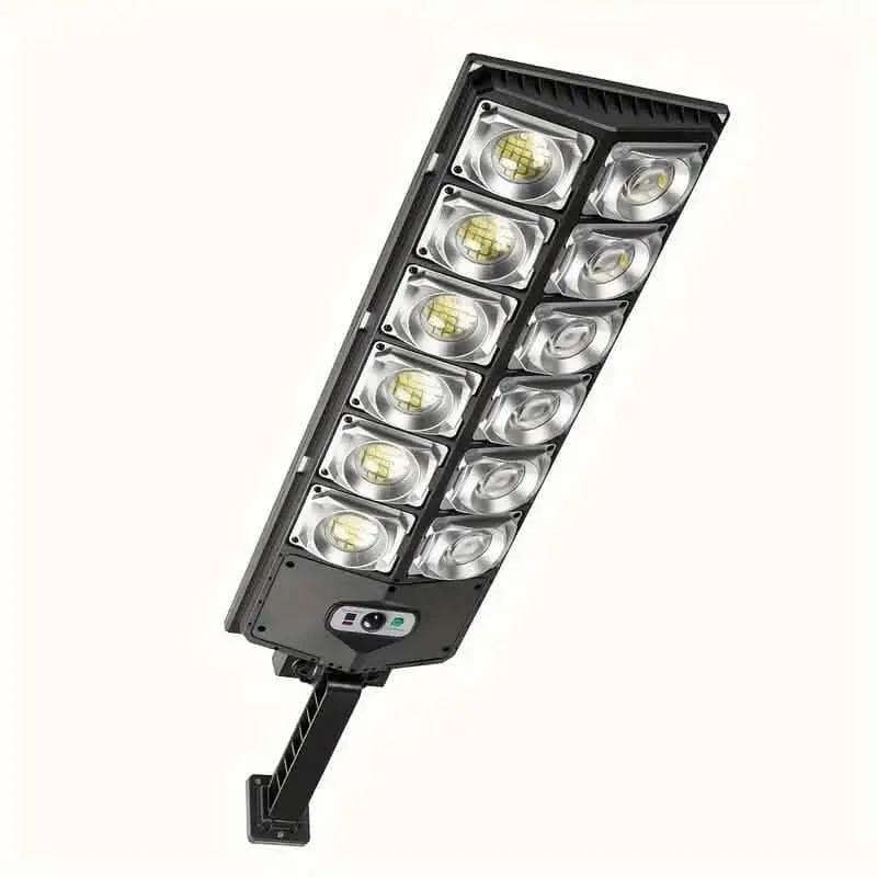 Solar LED street light with double row housing and multiple circular LED modules