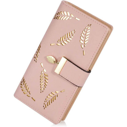 Pink long leaf-pattern bifold wallet with gold-tone clasp and leaf cutout details.