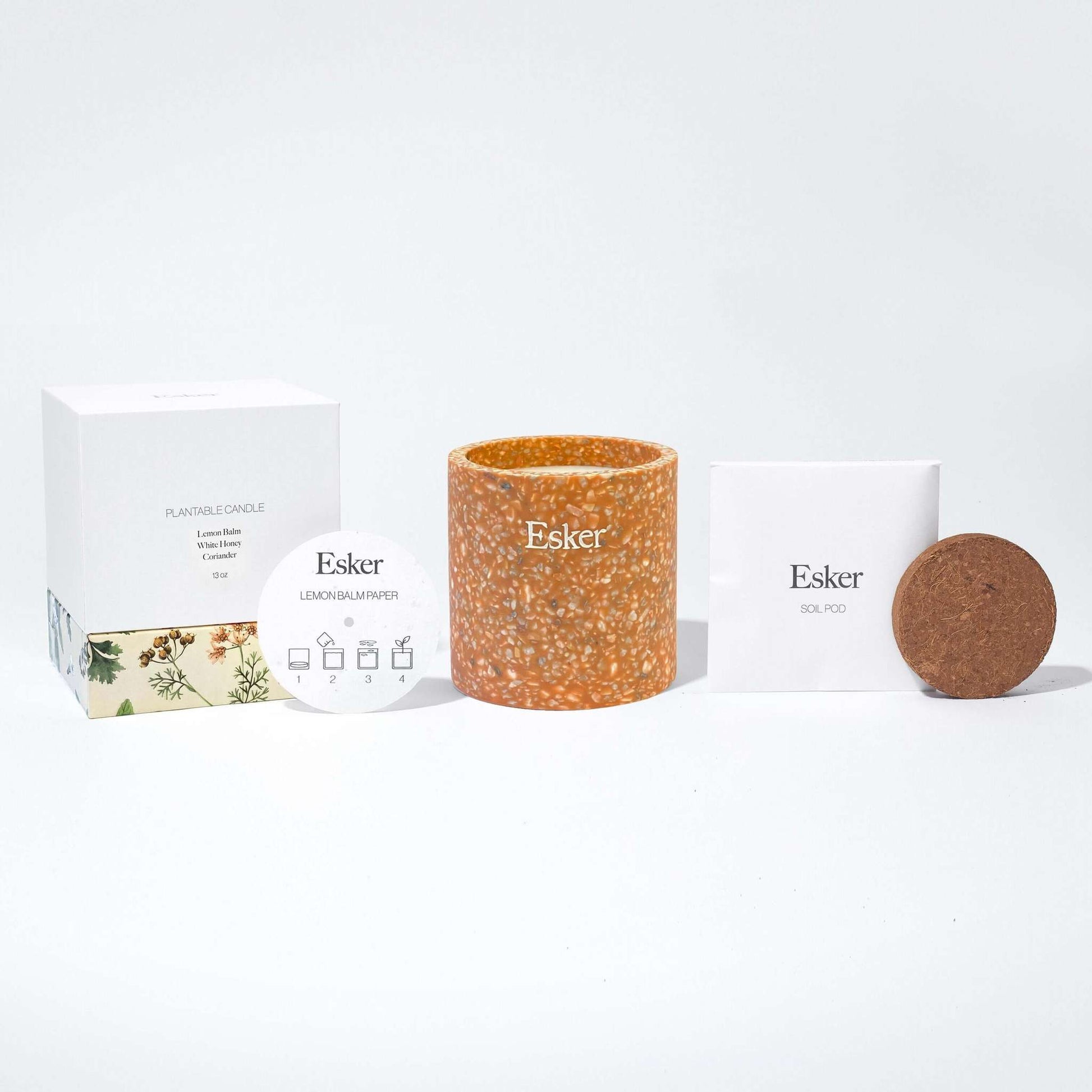 Plantable terracotta candle with Esker label, with matching lid and gift packaging