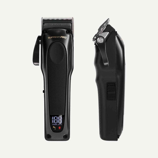 Black professional hair clipper, front and side views showing blade lever