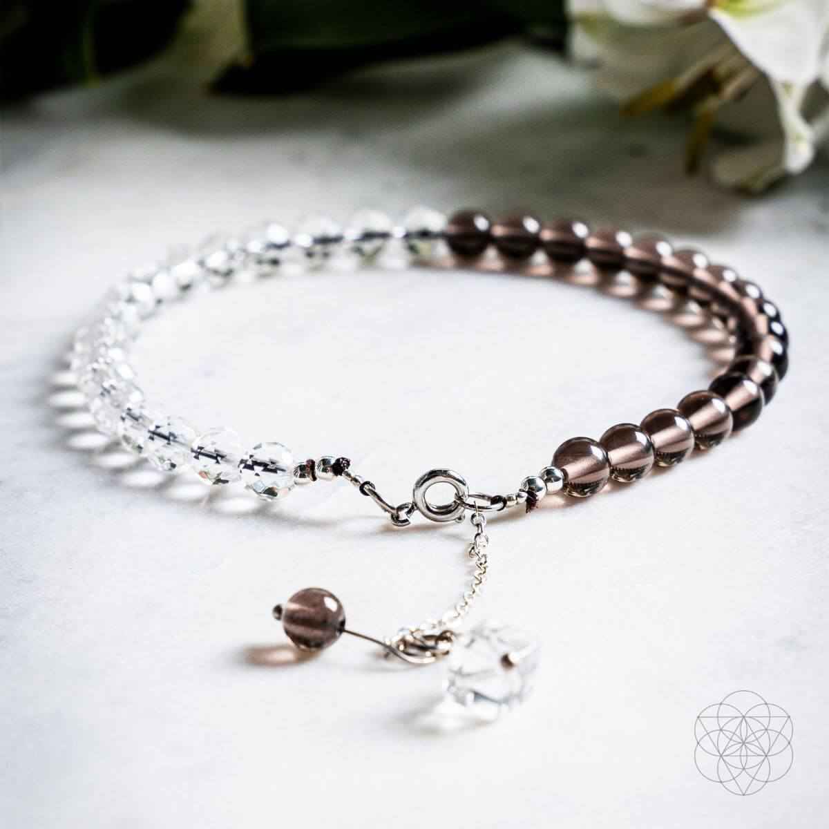 Two-row anklet with silver and smoky brown beads and crystal dangles, clasp visible