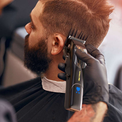 Hair clipper trimming a beard near the cheek with a precision blade