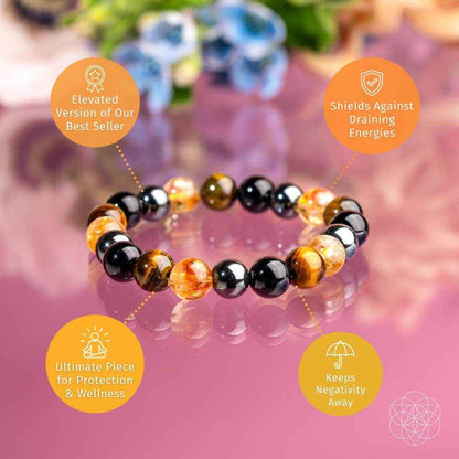Beaded protection bracelet with black and amber gemstone-style beads, stretch fit.