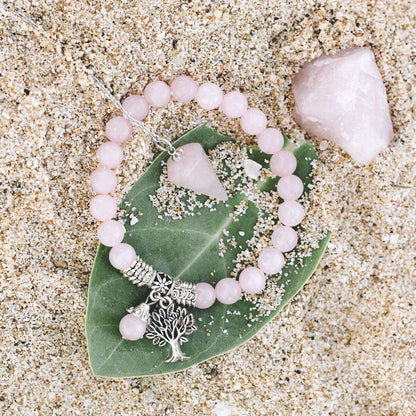 Rose quartz healing crystal set with pink beaded bracelet and raw rose quartz stones