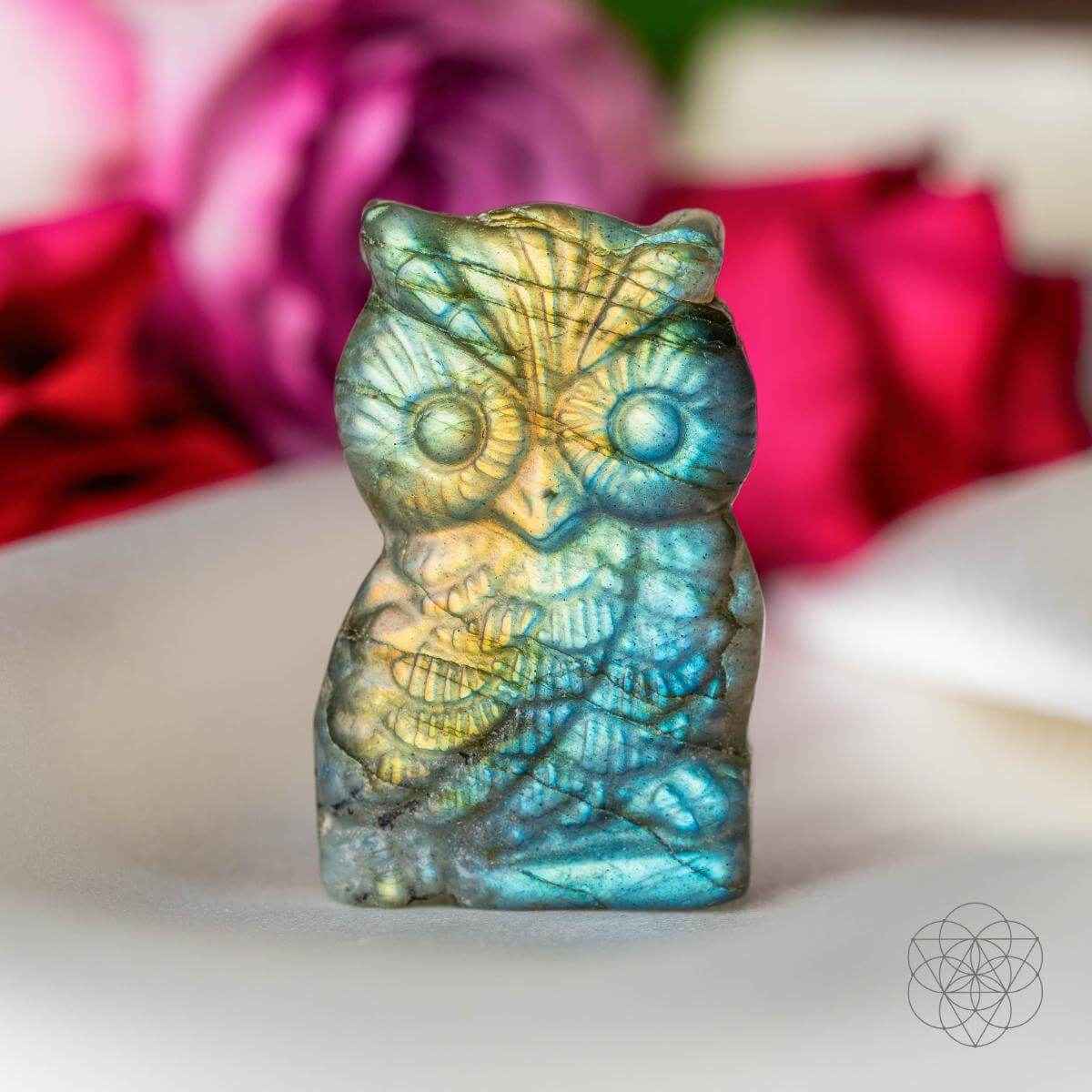Multicolor labradorite owl talisman carved figurine with blue and green tones